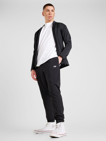 new balance Normalny krój Spodnie sportowe 'Essentials Active' w kolorze czarny