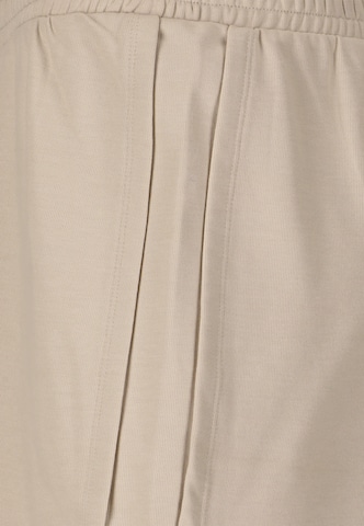 NOU Loose fit Trousers 'Vacay' in Beige
