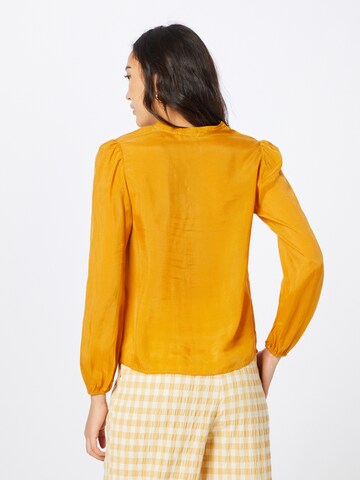System Action - Blusa 'Kobe' en marrón