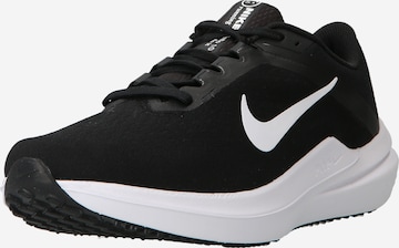 Chaussure de course NIKE en noir : devant