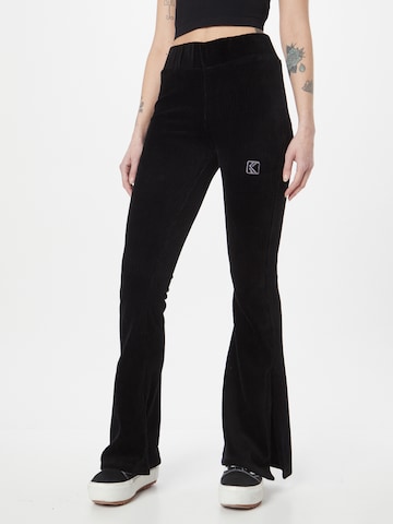 Karl Kani Flared Trousers in Black: front