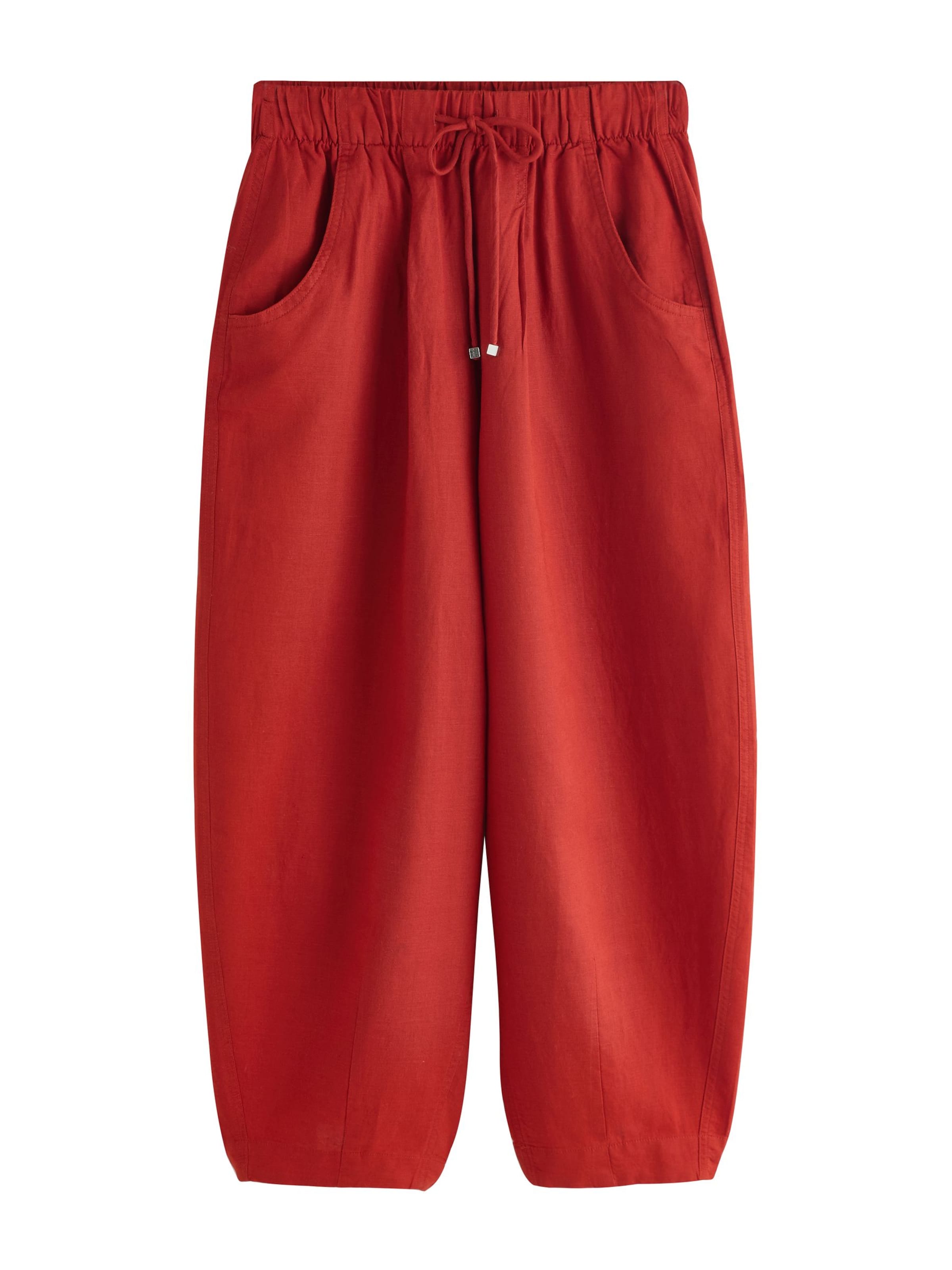 Pantaloni con pieghe di Next in rosso: frontale