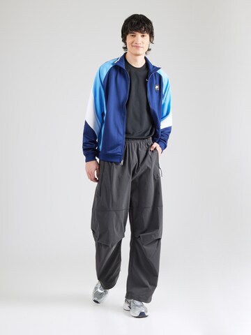 Loosefit Pantalon Nike Sportswear en gris