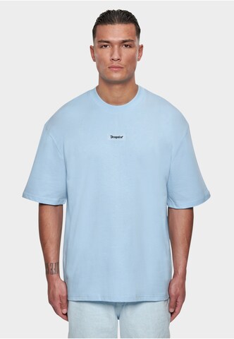Dropsize T-shirt i blå: framsida