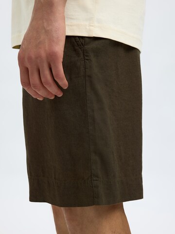 SELECTED HOMME Loosefit Nadrág 'SLHMAGNUS' - zöld