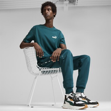 Tricou 'Essentials+' de la PUMA pe verde