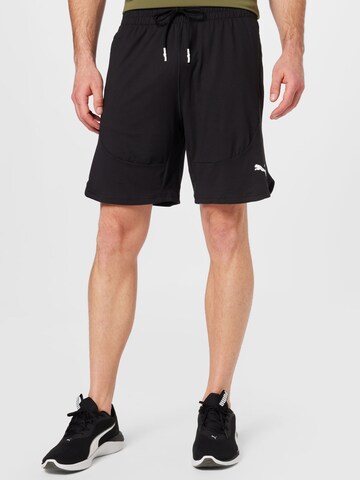 PUMA - Regular Calças de desporto em preto: frente