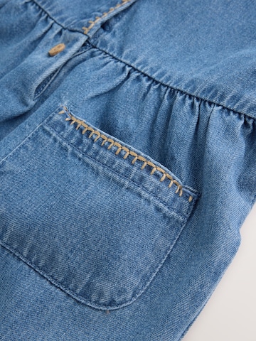 Ensemble Next en bleu