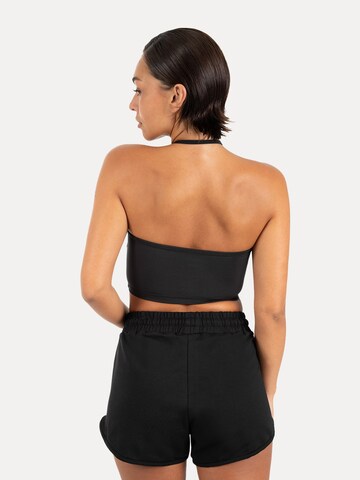 Haut de sport ' Florea ' Smilodox en noir