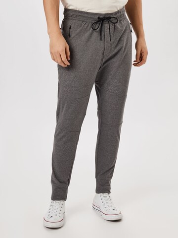 American Eagle Tapered Pants in Grey: front