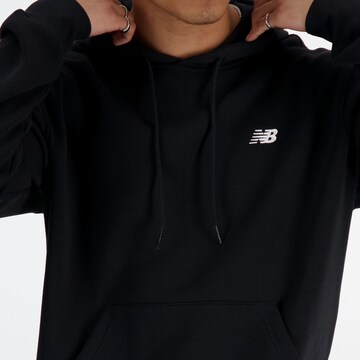 new balance Sweatshirt 'Sport Essentials Fleece Hoodie' in Zwart