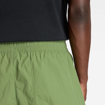 new balance Workout Pants 'Castlefield Woven Short 7"' in Green / Grass green, Item view