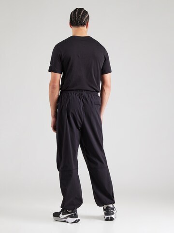 Nike Sportswear Loosefit Broek 'Tech' in Zwart