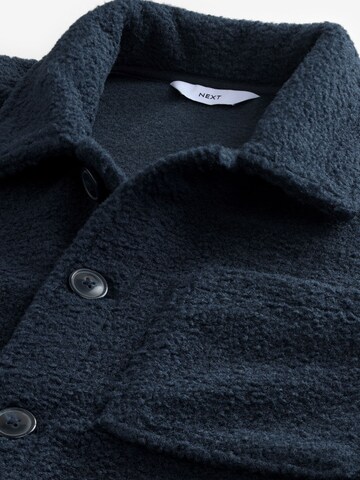 Next Tussenjas in Blauw