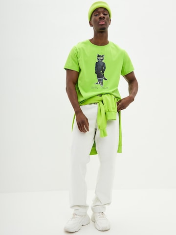 Cat e Lolette - Camiseta 'Sport Cat' en verde