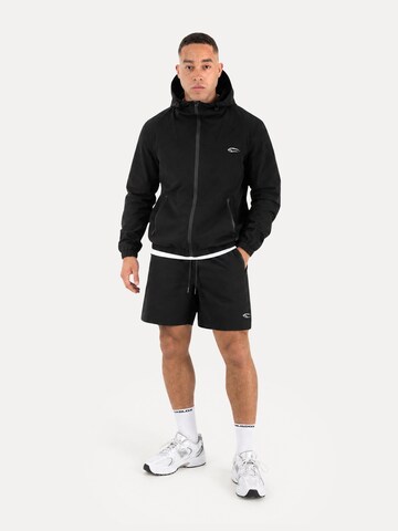 Regular Pantalon de sport ' Powerfit Riven ' Smilodox en noir