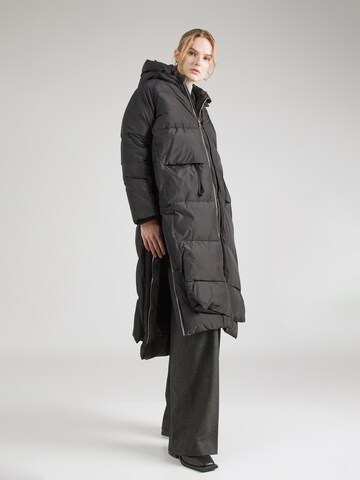 Embassy of Bricks and Logs Winter coat in Black