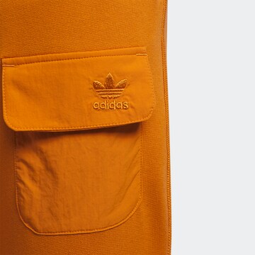 ADIDAS ORIGINALS Tapered Hose 'Ivy Park' in Orange