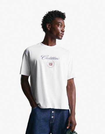 T-Shirt 'CADILLAC' Bershka en blanc