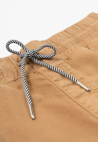recolution Tapered Chino Pants in Beige
