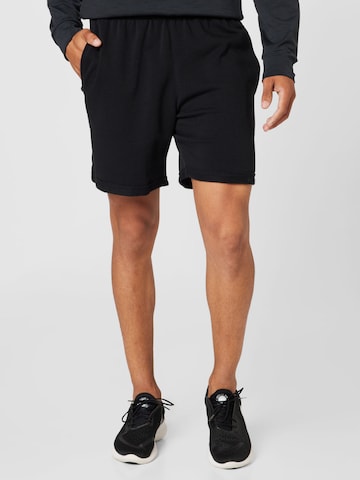 NIKE Regular Sports trousers in Black: front