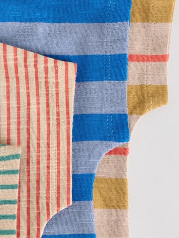 Barboteuse / body Next en mélange de couleurs