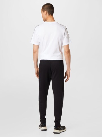 ADIDAS SPORTSWEAR Tapered Sportbroek in Zwart