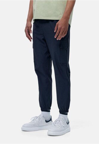 Born Living Yoga Tapered Weatherproof pants 'Minho' in Black: front