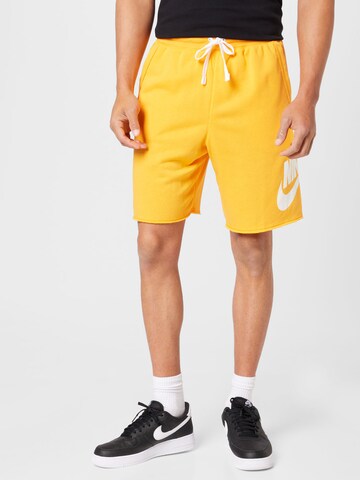 Nike Sportswear Loosefit Broek 'CLUB ALUMNI' in Oranje: voorkant