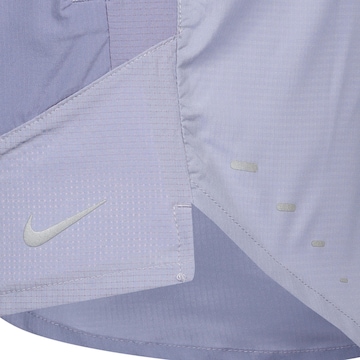 NIKE Regular Workout Pants 'Stride Nvlty' in Purple