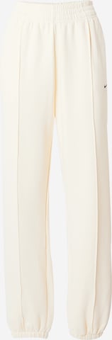 Nike Sportswear Tapered Pants 'Swoosh' in White: front