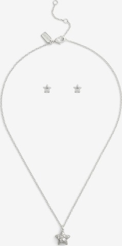 sidabrinė COACH Juvelyrinių dirbinių rinkinys: priekis