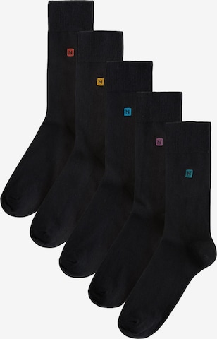 Next Nogavice | črna barva: sprednja stran