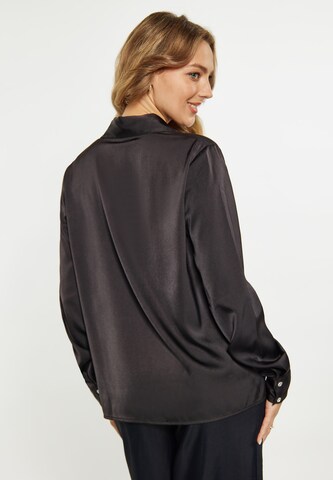 Camicia da donna di faina in nero