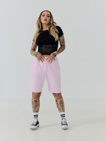 ABOUT YOU x Sharlota Regular Trousers 'Tessa' in Pink