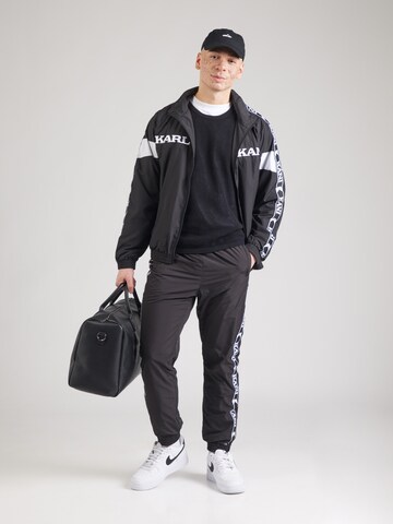 Tapered Pantaloni di Karl Kani in nero