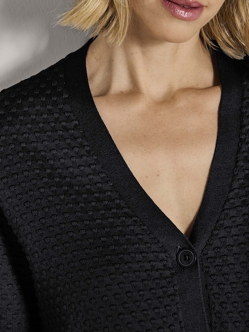 MADELEINE Gebreid vest in Zwart