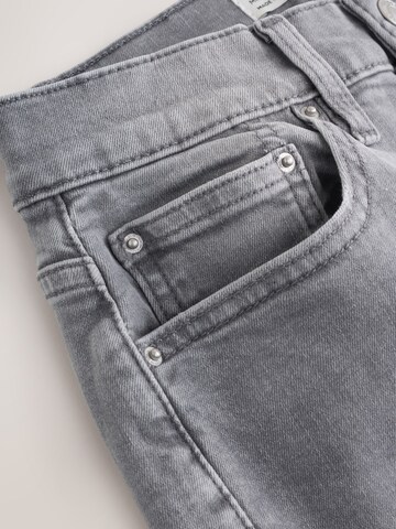 Next Slimfit Farkut värissä harmaa