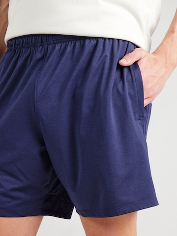 UNDER ARMOUR Regular Sports trousers in Blue