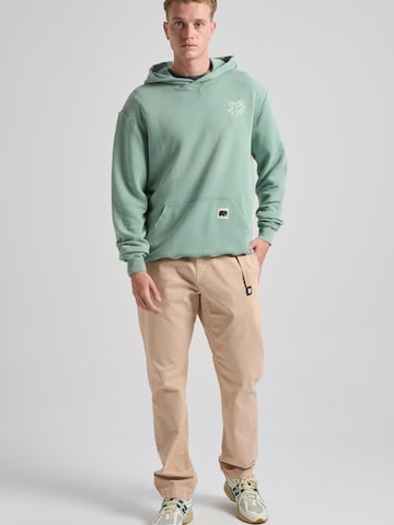 Trendsplant Bluzka sportowa 'FLOWERS' w kolorze zielony: przód