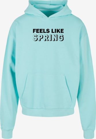 Sweat-shirt 'Spring - Feels Like' Merchcode en bleu : devant