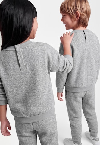 Nike Sportswear Jogging ruhák 'ESSENTIAL' - szürke