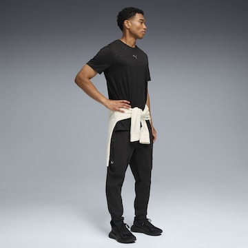 Effilé Pantalon de sport PUMA en noir