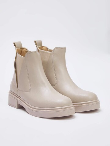 Trendyol Chelsea boots in Beige