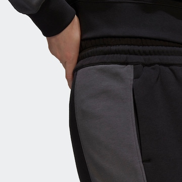 ADIDAS ORIGINALS Tapered Pants in Black