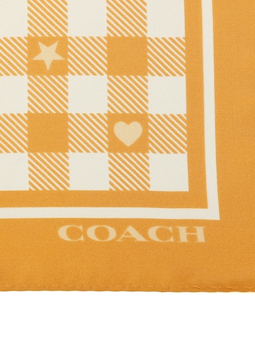 COACH - Pañuelo en naranja
