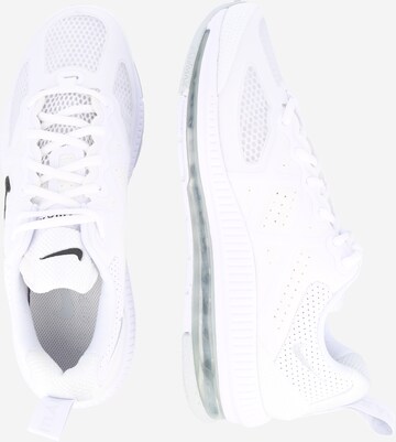 Nike Sportswear Matalavartiset tennarit 'Genome' värissä valkoinen