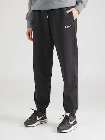 Nike Sportswear Tapered Trousers in Black: front