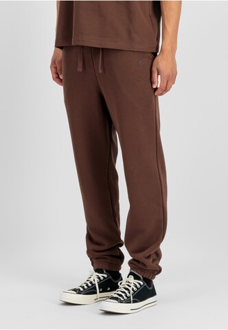 ALPHA INDUSTRIES Tapered Pants 'DTM' in Brown: front