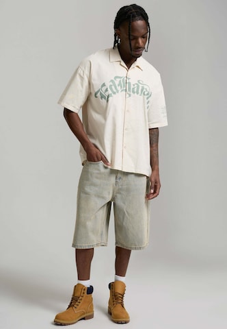 Ed Hardy Широка кройка Дънки в синьо